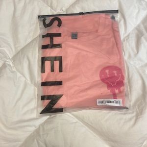 COPY - This a tshirt that’s says everything will be ok on the back